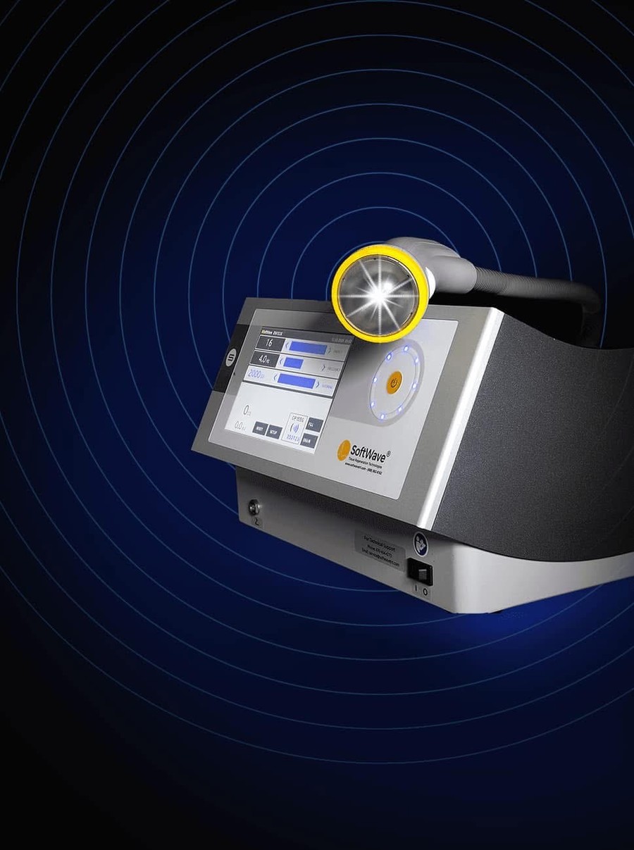 A SoftWave TRT unit with the applicator active